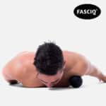 Lille massagebold der kan ramme de små muskler i skulderen